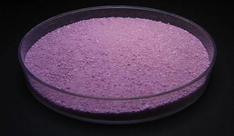 Purple powder of Silk Peptide Gold Complex in a dish