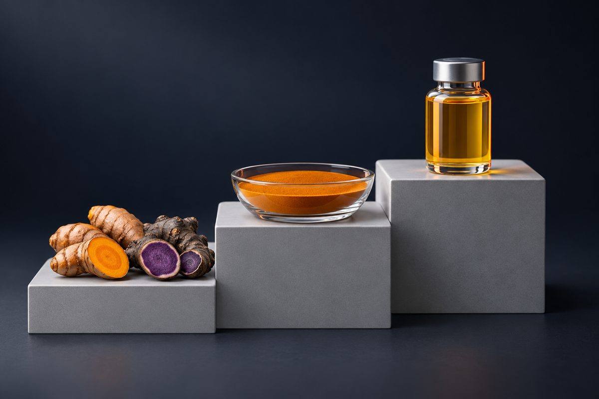 Fresh turmeric and black ginger, extract powder in a glass dish and a bottle of golden liquid extract